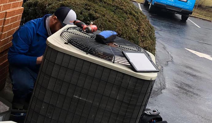 Skilled technician performing professional AC installation