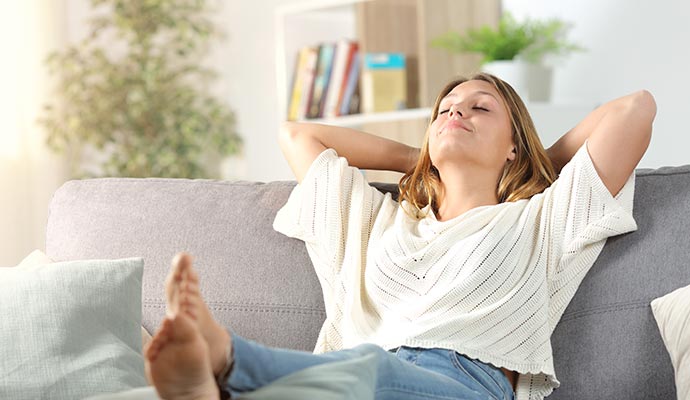 a person enjoting good indoor air quality in living room