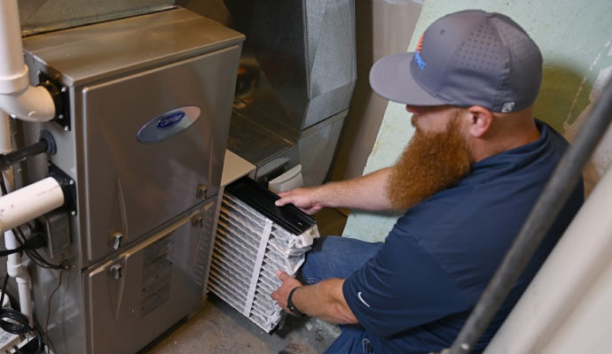 professional worker maintaining heating system